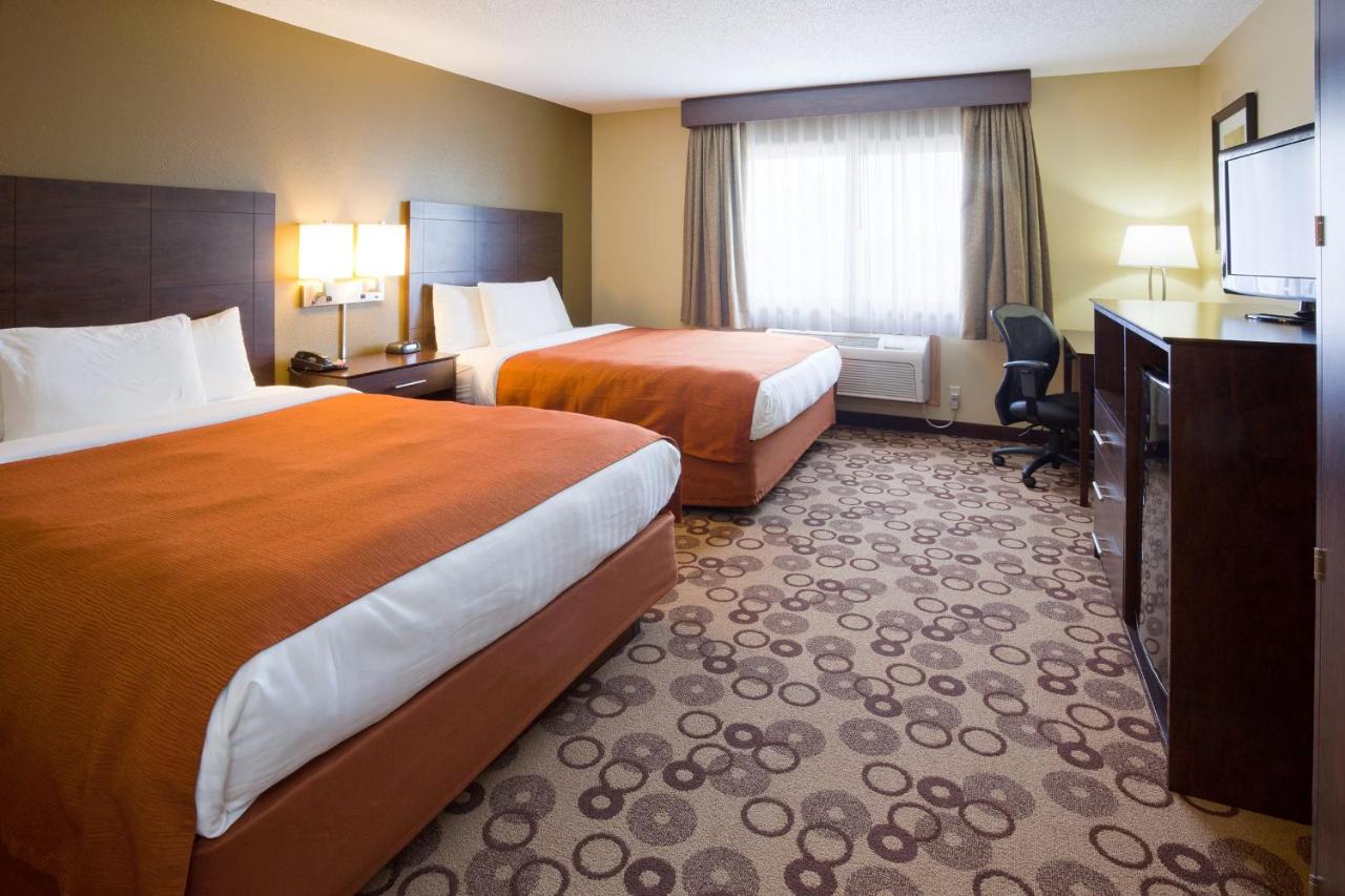 Queen Room with Two Queen Beds - Non-Smoking at AmericInn by Wyndham Blue Earth