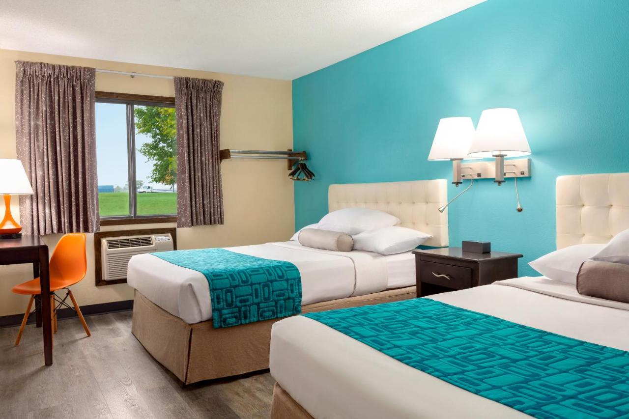 Queen Room with Two Queen Beds - Non-Smoking at Howard Johnson by Wyndham Waterloo/Cedar Falls