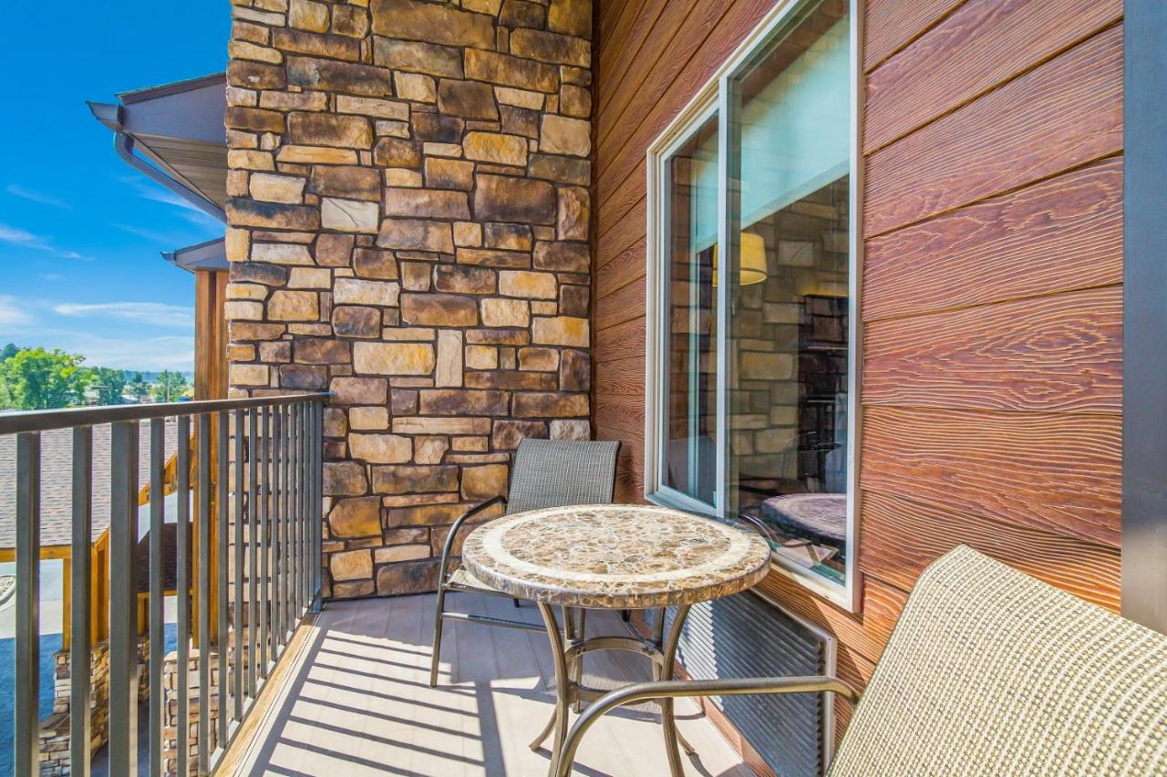 Queen Room with Two Queen Beds and Balcony - Non-Smoking at Holiday Inn Express Hotel & Suites Custer by IHG