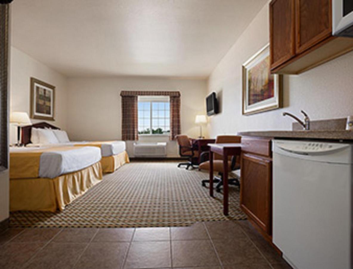 Queen Room with Two Queen Beds - Non-Smoking at Days Inn & Suites by Wyndham Columbus NE
