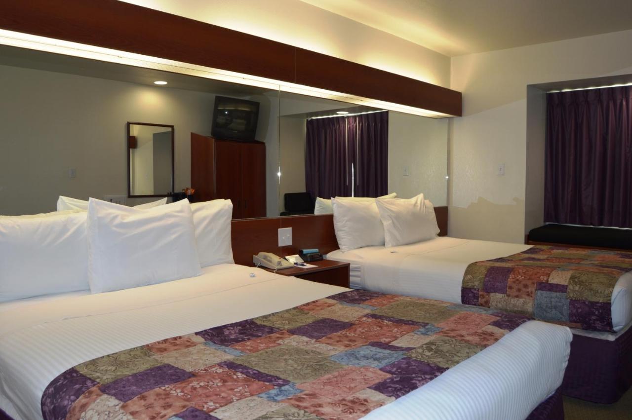 Deluxe Queen Room with Two Queen Beds - Disability Access - Non-Smoking at Microtel Inn & Suites by Wyndham Miami