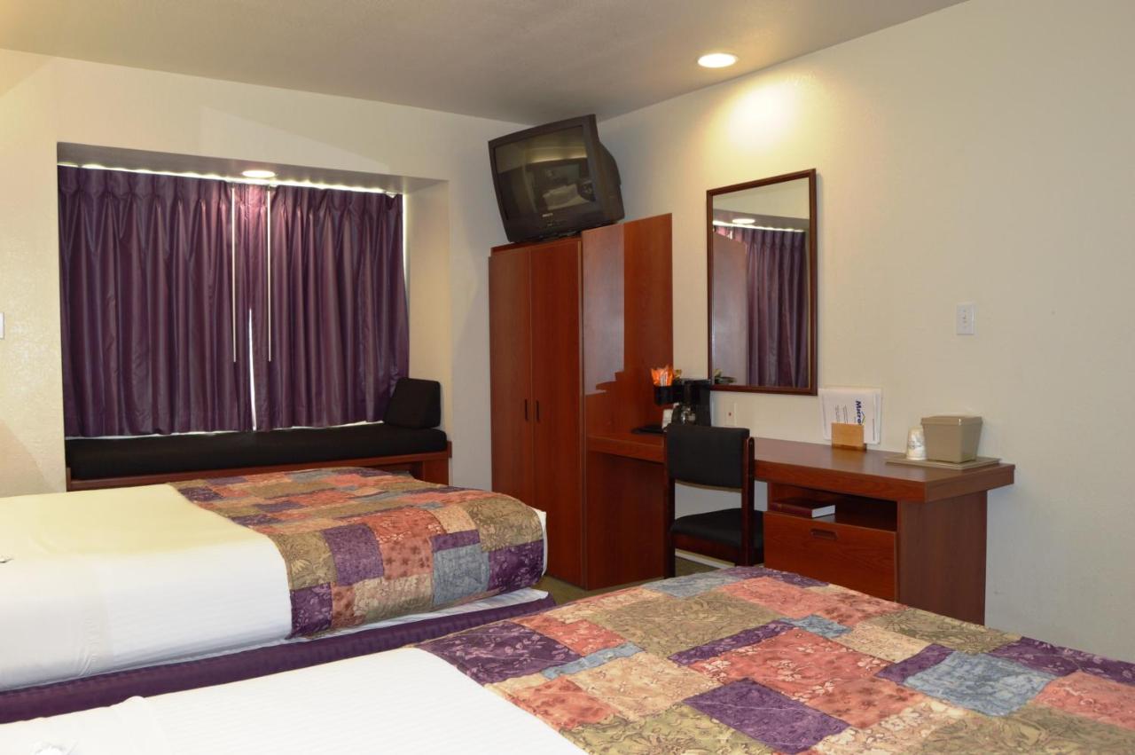Queen Room with Two Queen Beds - Non-Smoking at Microtel Inn & Suites by Wyndham Miami
