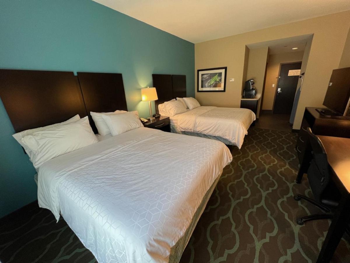 Queen Room with Two Queen Beds - Disability Access Roll in Shower at Holiday Inn Express & Suites Cuero by IHG