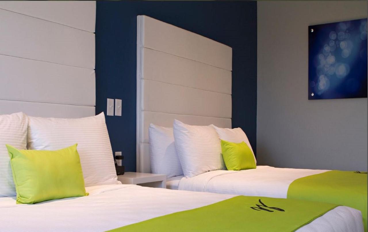 Queen Room with Two Queen Beds - Non-Smoking at The Wallhouse Hotel, an Ascend Collection Hotel