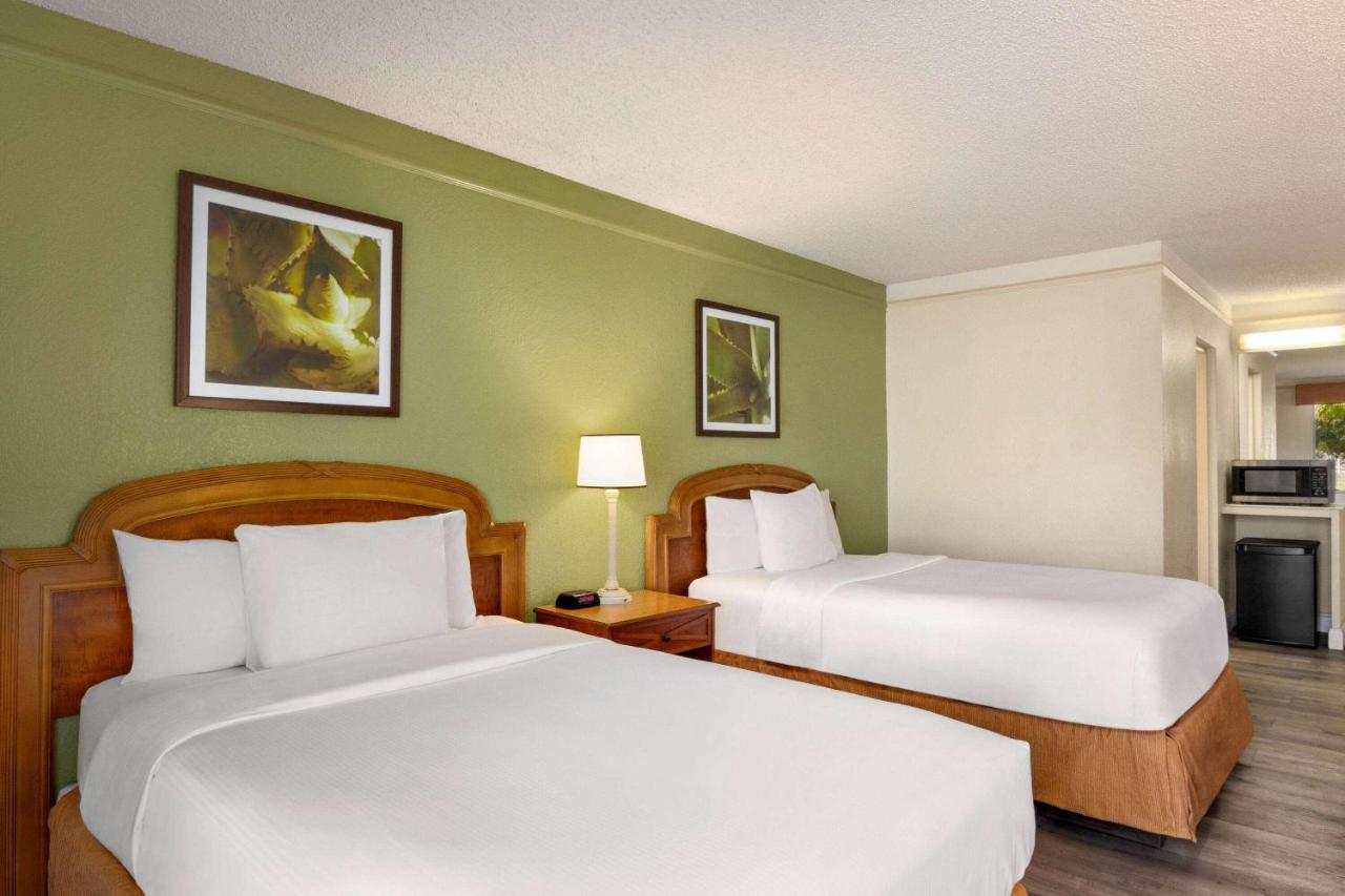 Double Room with Two Double Beds and Roll-In Shower - Mobility Access/Non-Smoking at Baymont by Wyndham Daytona Beach/Intl Speedway
