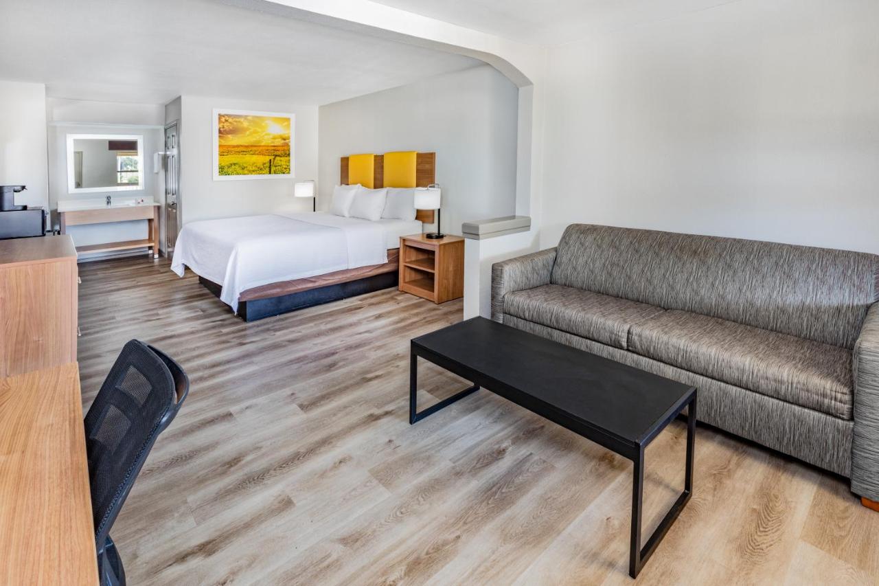 King Suite- Non-Smoking at Days Inn & Suites by Wyndham Huntsville