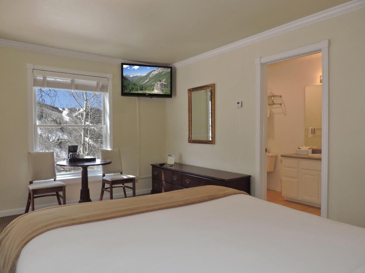 Signature One Queen Bed at The Victorian Inn