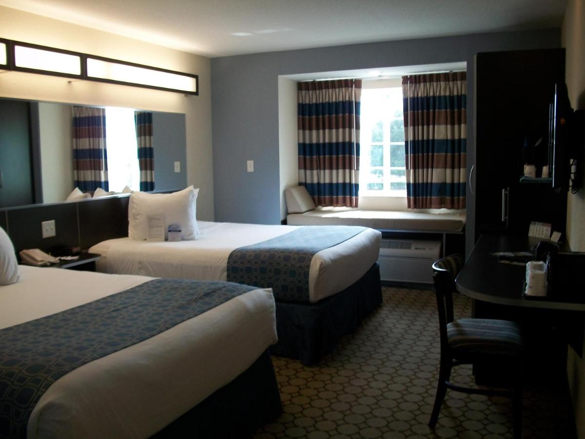 Queen Room with Two Queen Beds - Non-Smoking at Microtel Inn & Suites by Wyndham Spring Hill/Weeki Wachee