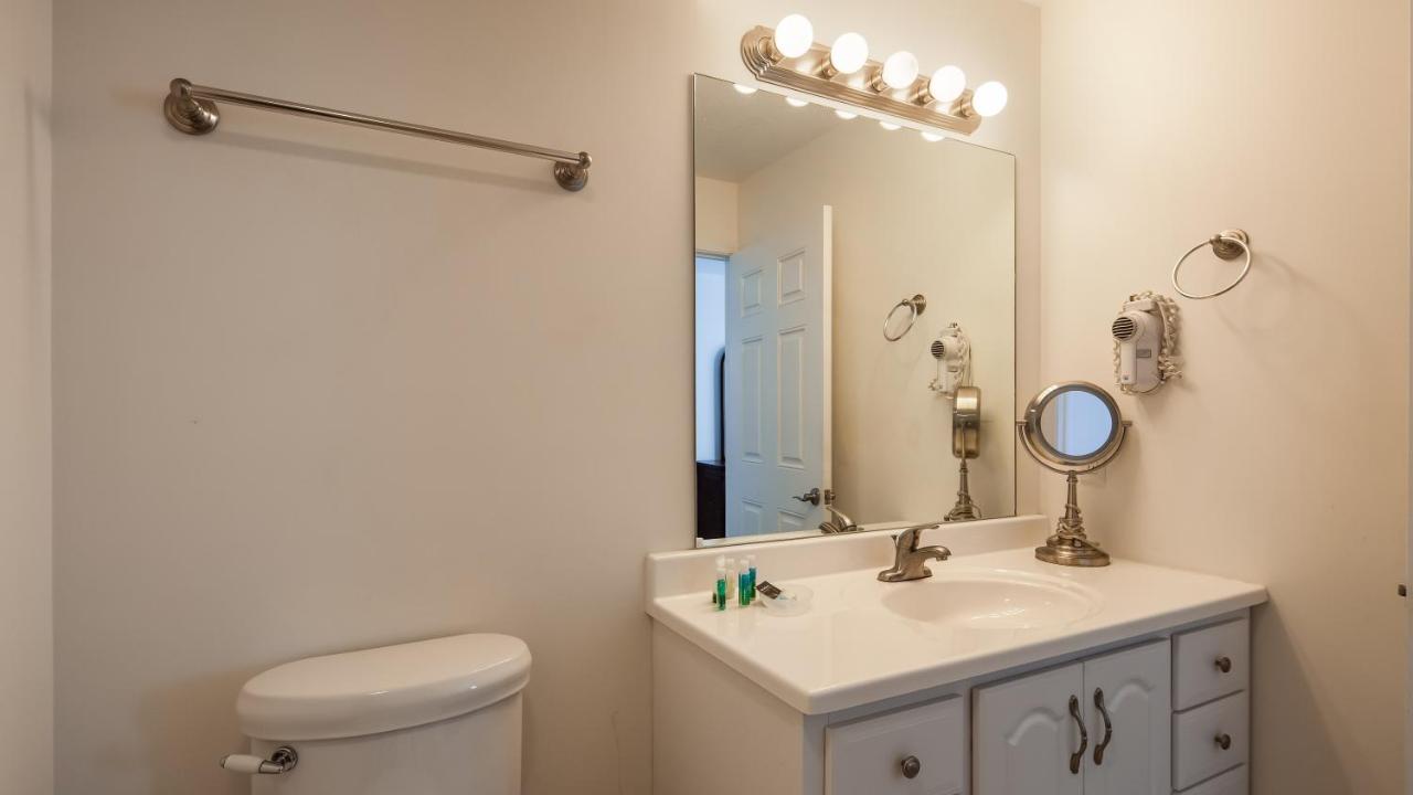 King Suite with Sofa Bed and Lake View at Charlevoix Inn & Suites SureStay Collection by Best Western