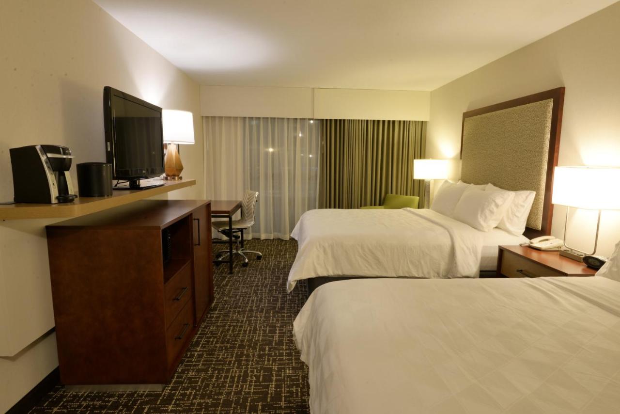 Queen Room with Two Queen Beds and Pool View at Holiday Inn Hotel & Suites Minneapolis - Lakeville by IHG