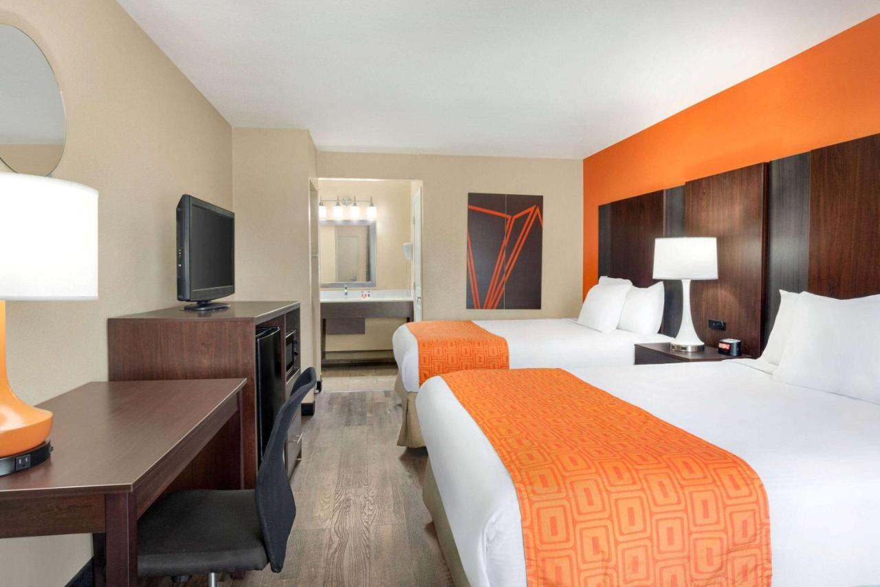 Queen Room with Two Queen Beds - Non-Smoking at Howard Johnson by Wyndham Pigeon Forge