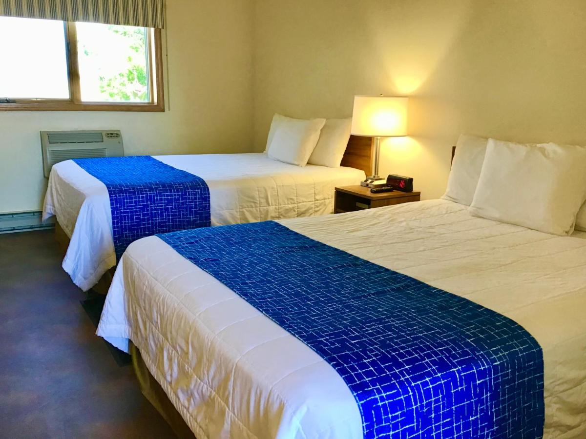 Queen Room with Two Queen Beds - Non-Smoking at Travelodge by Wyndham Three Forks