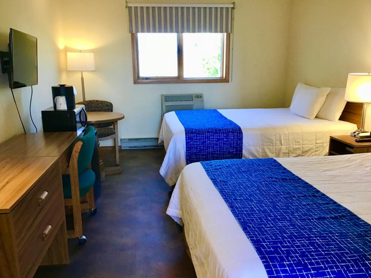 Queen Room with Two Queen Beds - Non-Smoking at Travelodge by Wyndham Three Forks
