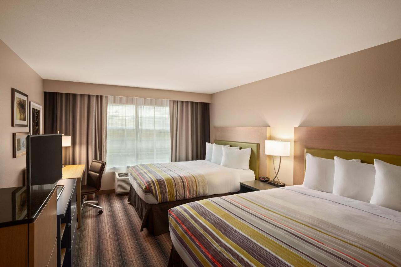 Queen Room with Two Queen Beds at Country Inn & Suites by Radisson, Bozeman, MT