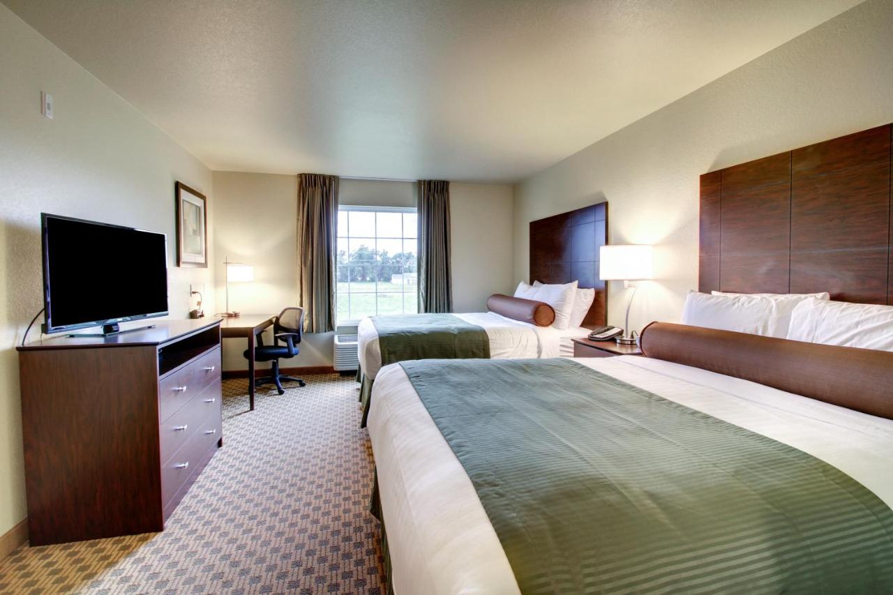 Queen Room with Two Queen Beds at Cobblestone Inn & Suites - Schuyler