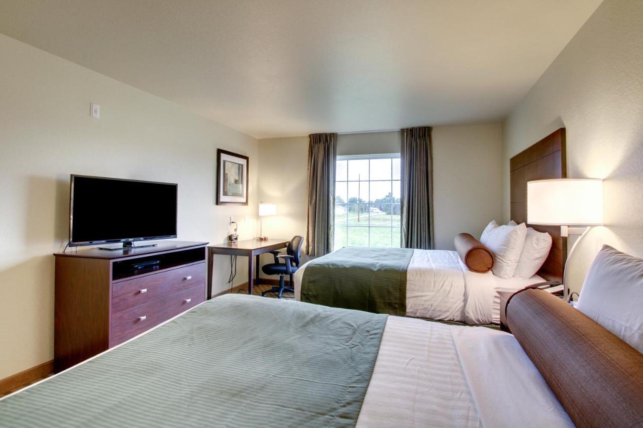 Queen Room with Two Queen Beds at Cobblestone Inn & Suites - Schuyler