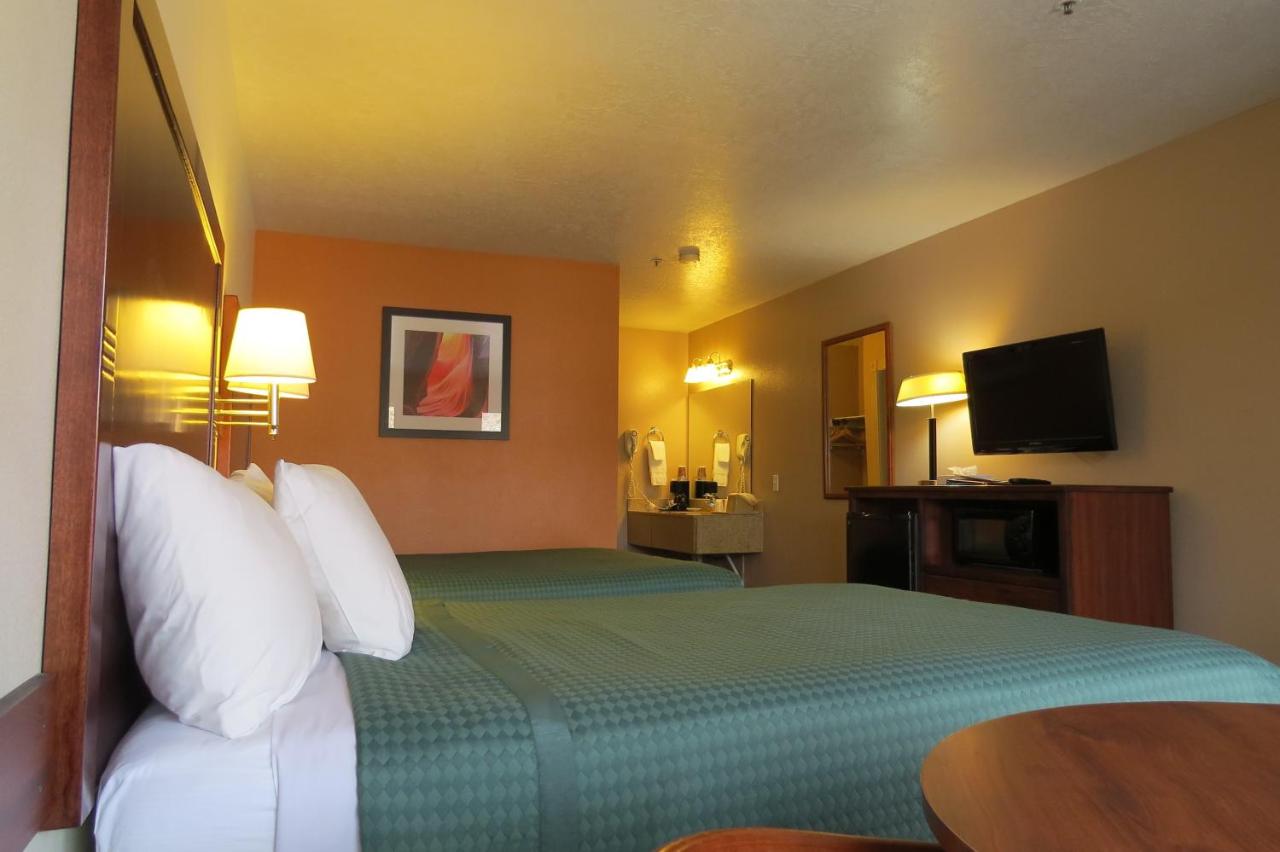 Queen Room with Two Queen Beds - Non-Smoking at America's Best Inn & Suites