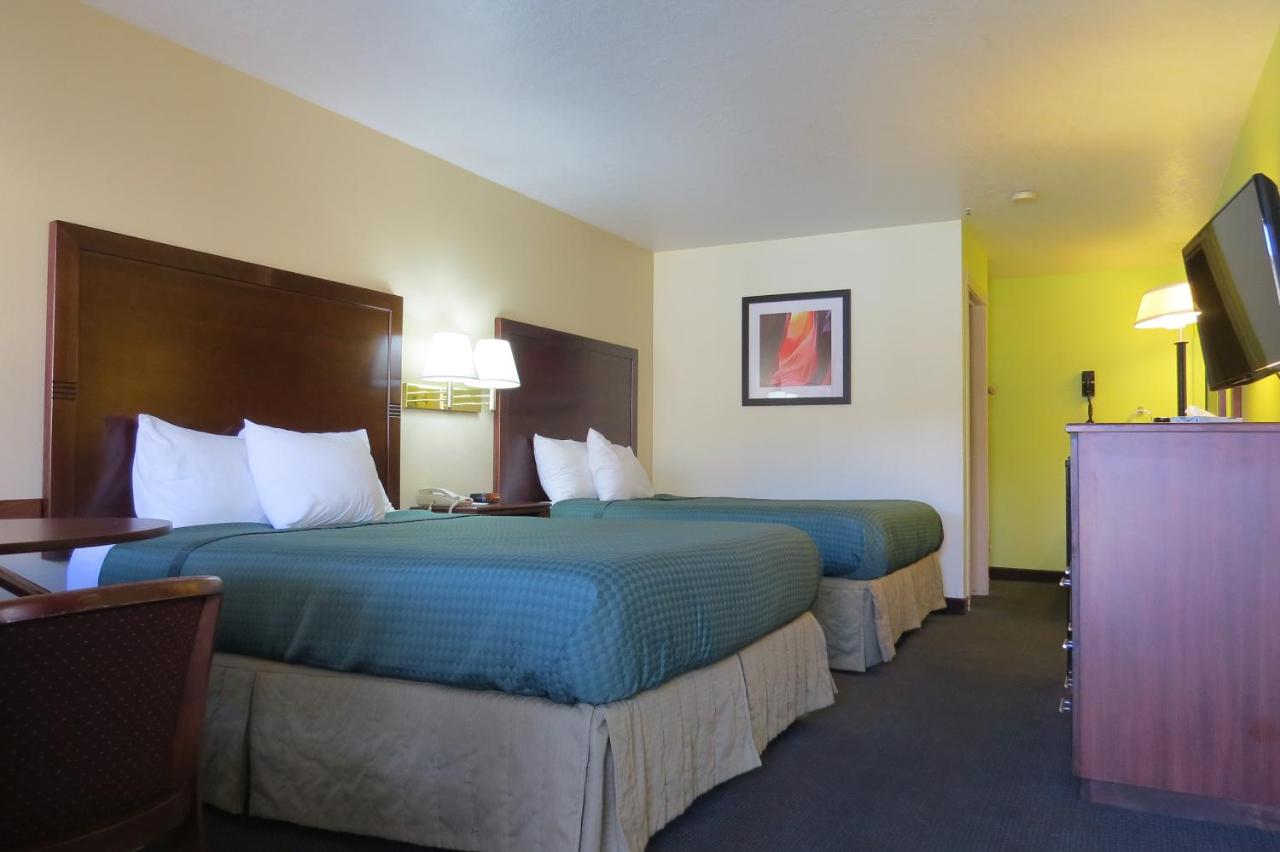 Queen Room with Two Queen Beds - Non-Smoking at America's Best Inn & Suites