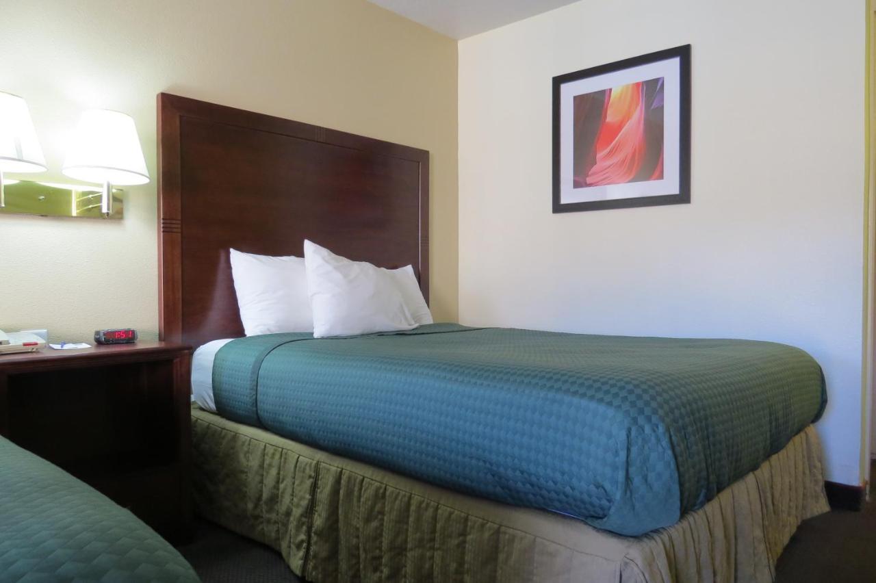 Queen Room with Two Queen Beds - Non-Smoking at America's Best Inn & Suites