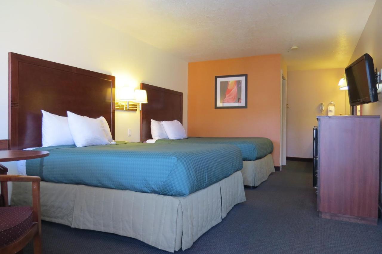 Queen Room with Two Queen Beds - Non-Smoking at America's Best Inn & Suites