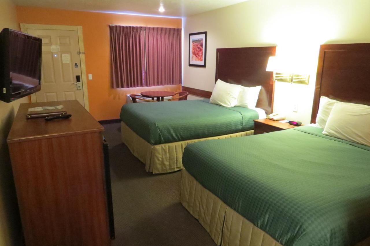 Queen Room with Two Queen Beds - Non-Smoking at America's Best Inn & Suites