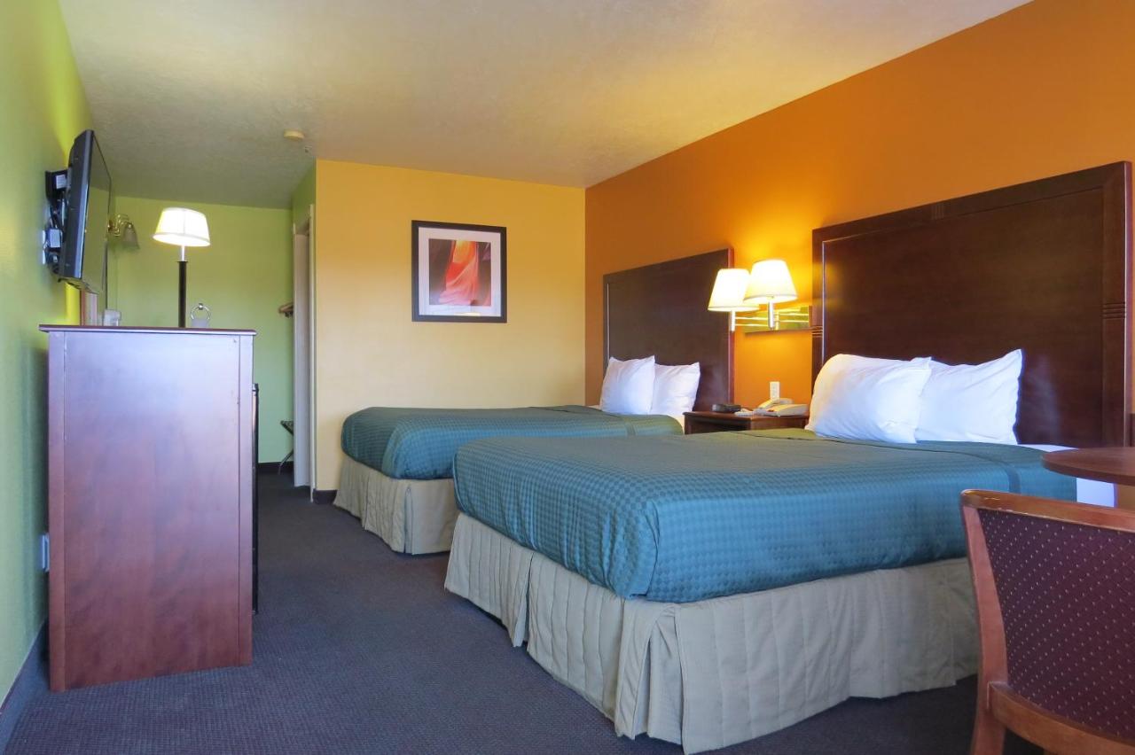 Queen Room with Two Queen Beds - Non-Smoking at America's Best Inn & Suites