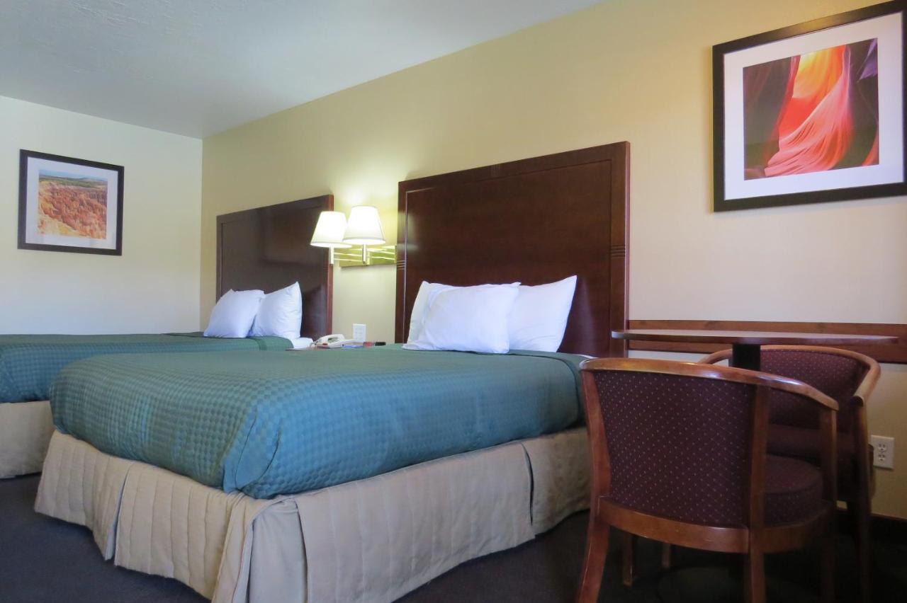 Queen Room with Two Queen Beds - Non-Smoking at America's Best Inn & Suites