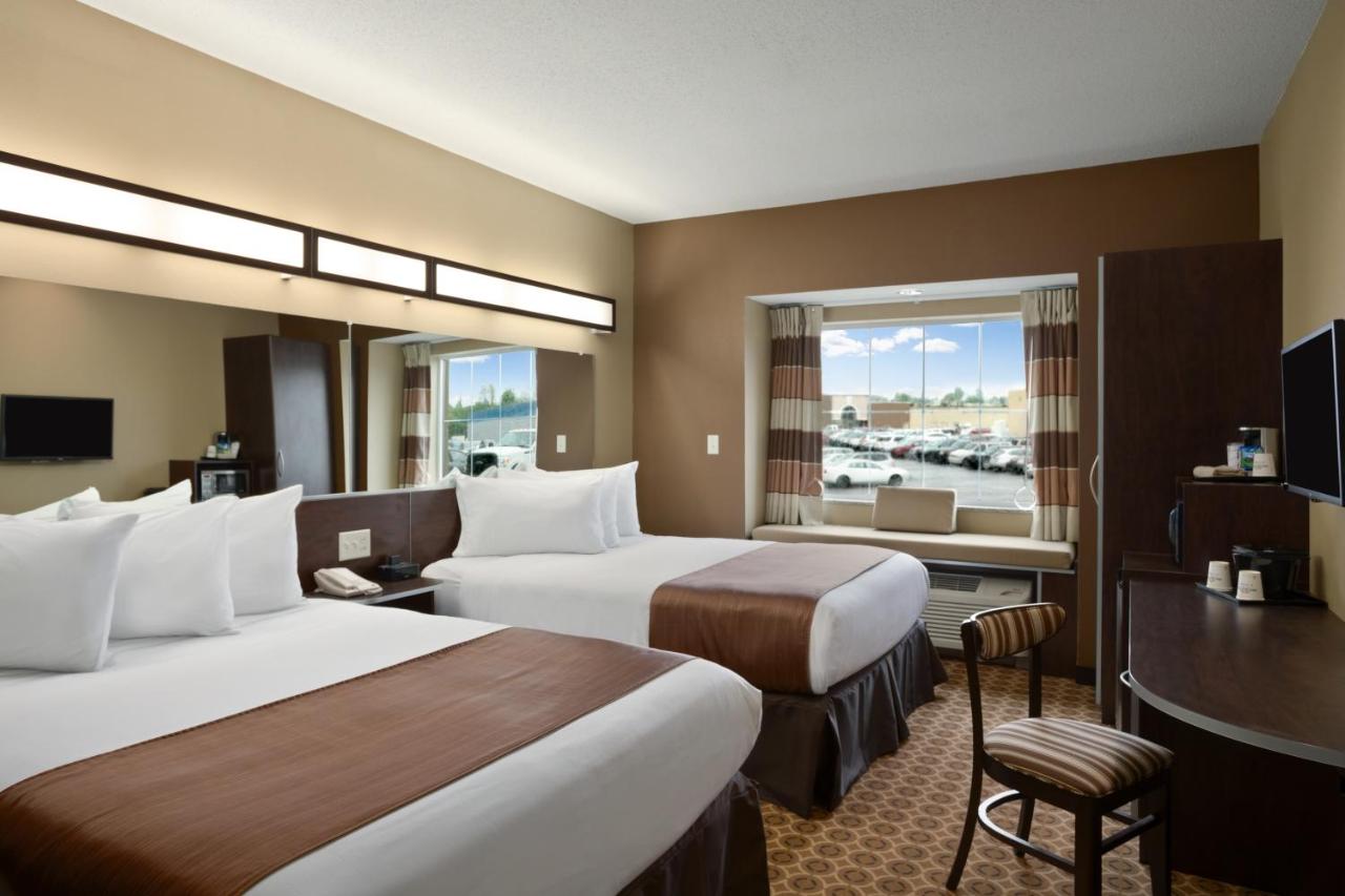 Deluxe Queen Room with Two Queen Beds - Non-Smoking at Microtel Inn & Suites By Wyndham Fairmont