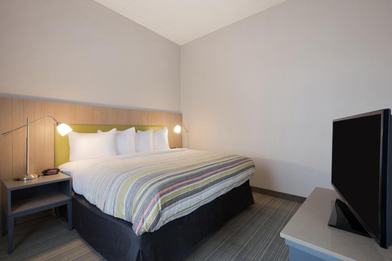 King Suite with Sofa Bed at Country Inn & Suites by Radisson, Katy (Houston West), TX