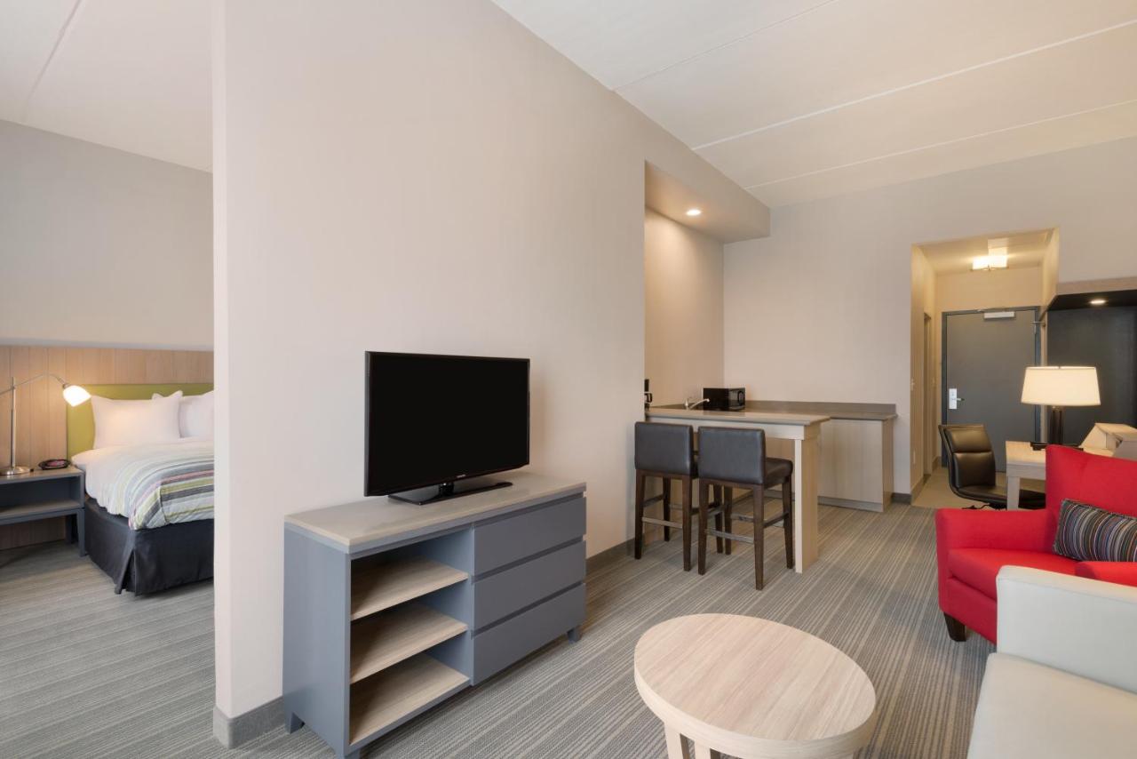 King Suite with Sofa Bed at Country Inn & Suites by Radisson, Katy (Houston West), TX