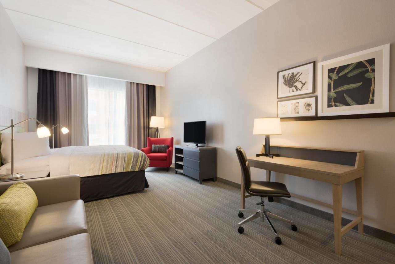 King Suite with Sofa Bed at Country Inn & Suites by Radisson, Katy (Houston West), TX