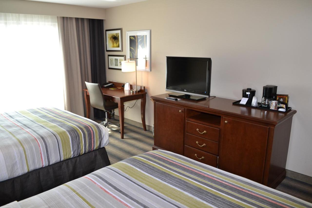Queen Room with Two Queen Beds at Country Inn & Suites by Radisson Roseville - St. Paul