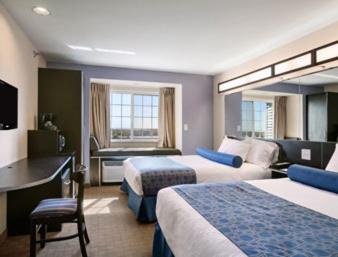 Deluxe Queen Room with Two Queen Beds- Disability Access - Non-Smoking at Microtel Inn & Suites by Wyndham Stanley