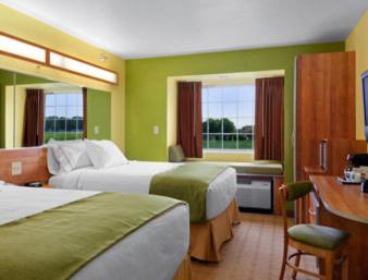Queen Room with Two Queen Beds - Non-Smoking at Microtel Inn & Suites by Wyndham Delphos