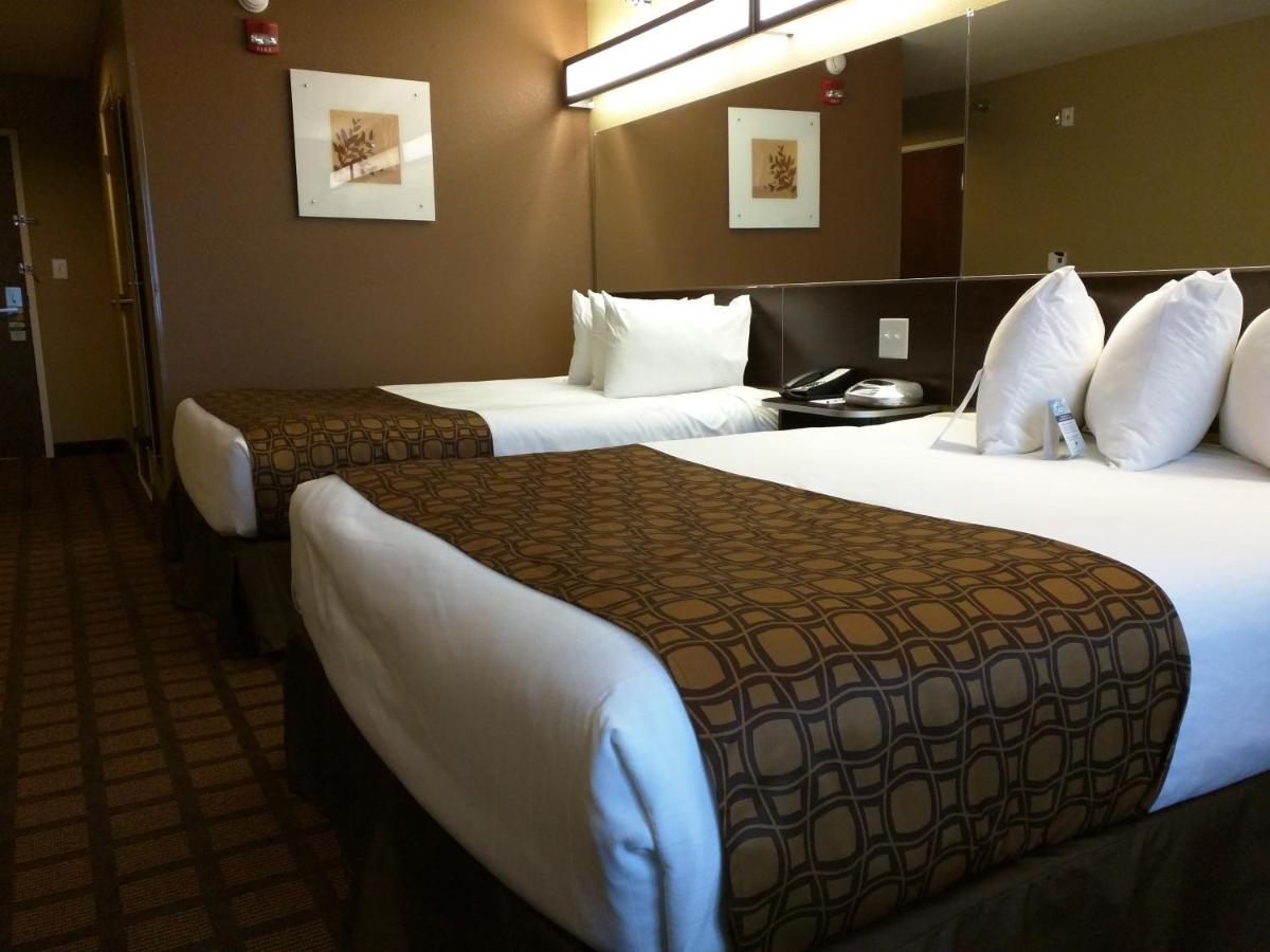 Queen Room with Two Queen Beds - Non-Smoking at Microtel Inn & Suites by Wyndham Minot