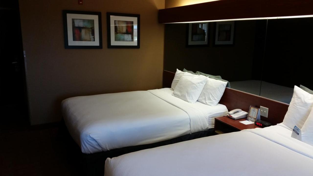 Queen Room with Two Queen Beds - Disability Access/Non-Smoking at Microtel Inn & Suites by Wyndham Starkville