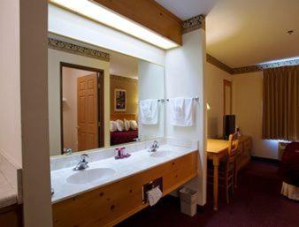 Queen Room with Two Queen Beds - Non-Smoking at Ramada by Wyndham Summerset Rapid City West