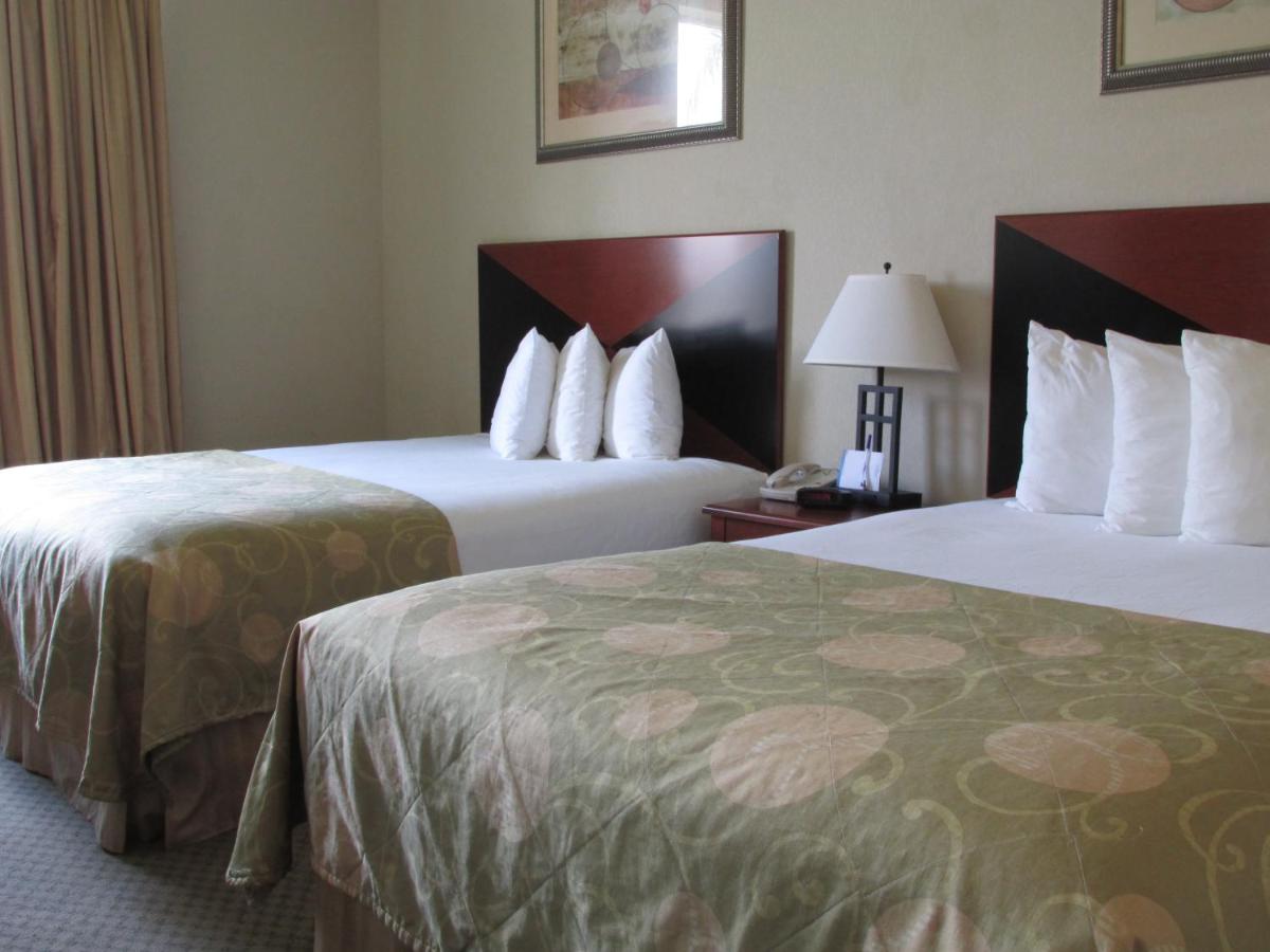 Queen Room with Two Queen Beds - Non-Smoking at Baymont by Wyndham Marrero