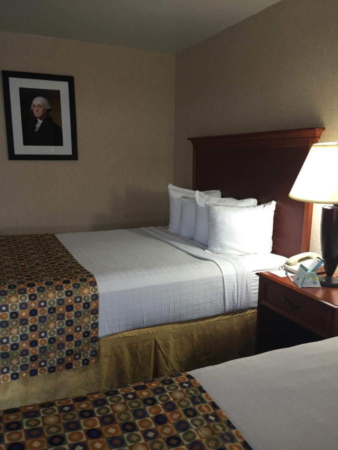Queen Room with Two Queen Beds with Roll-In Shower at Comfort Inn Pentagon