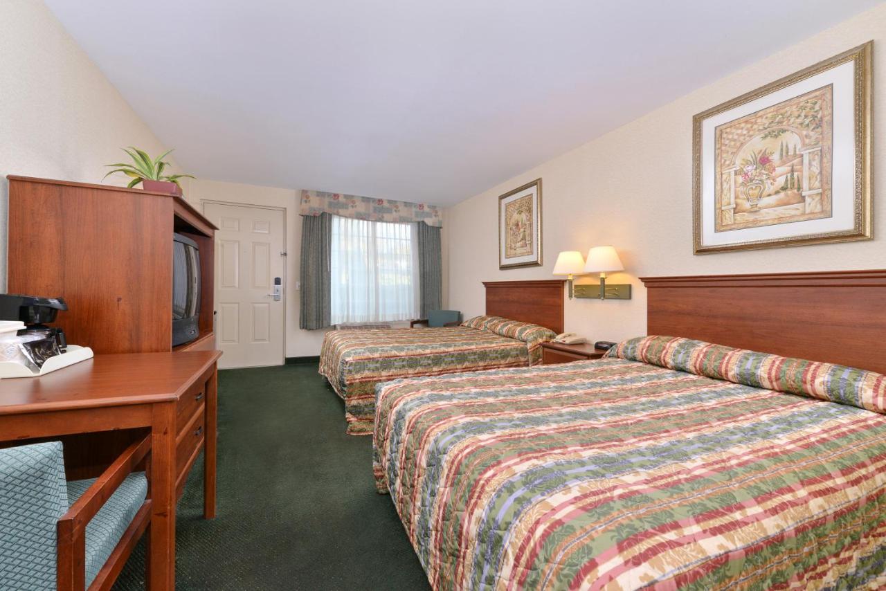 Room with Two Double Beds at Tower Inn And Suites Of Guilford - Madison