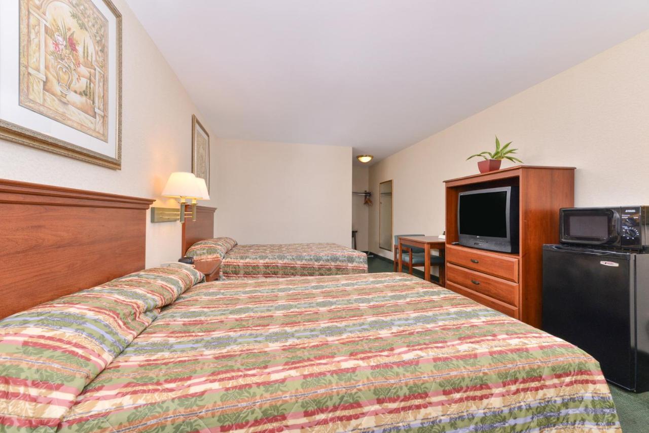 Room with Two Double Beds at Tower Inn And Suites Of Guilford - Madison