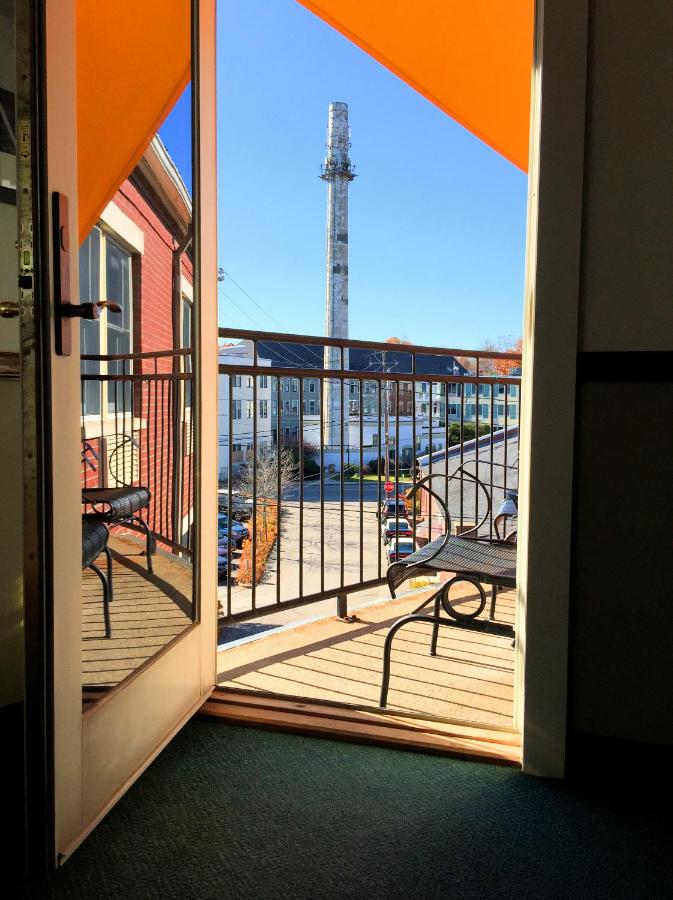 King Room with Balcony at Camden Riverhouse Hotel