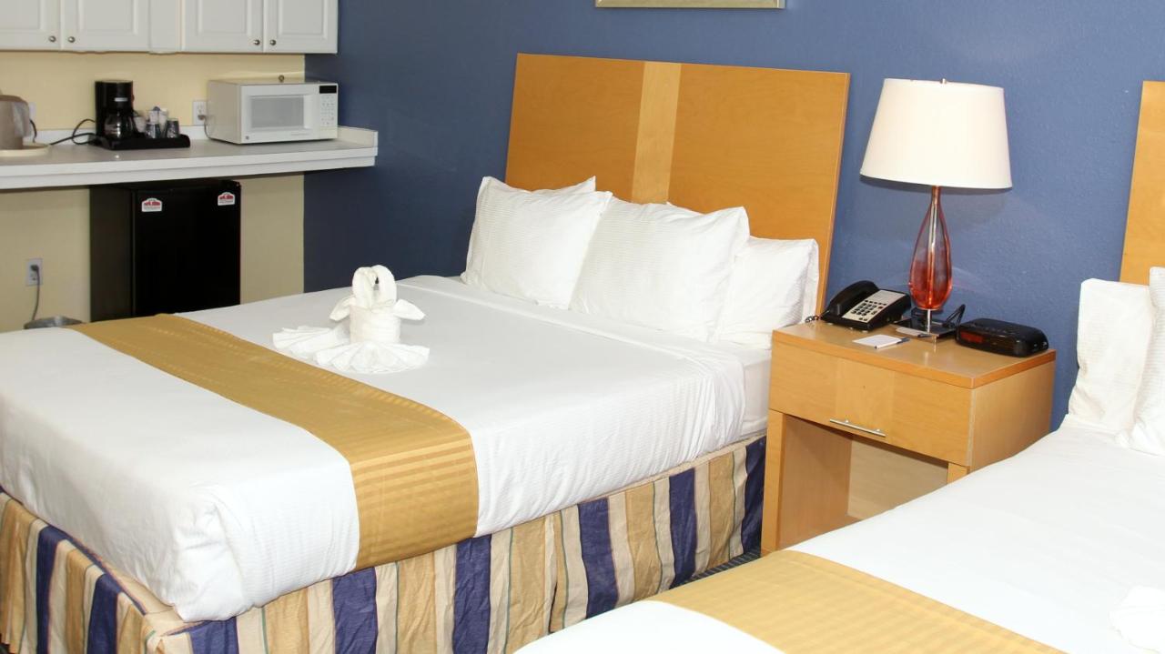 Queen Room with Two Queen Beds with City View at Chart House Suites on Clearwater Bay