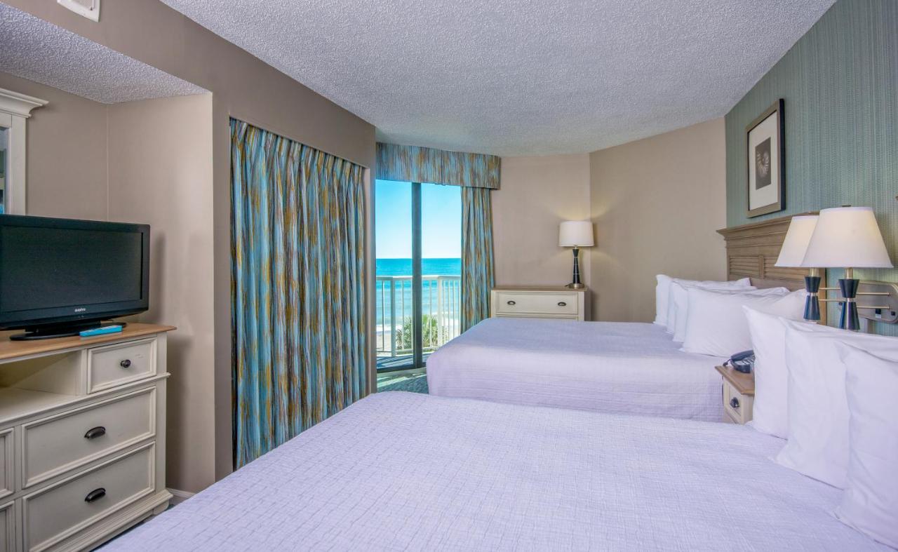 Queen Suite with Oceanfront View at The Strand - A Boutique Resort