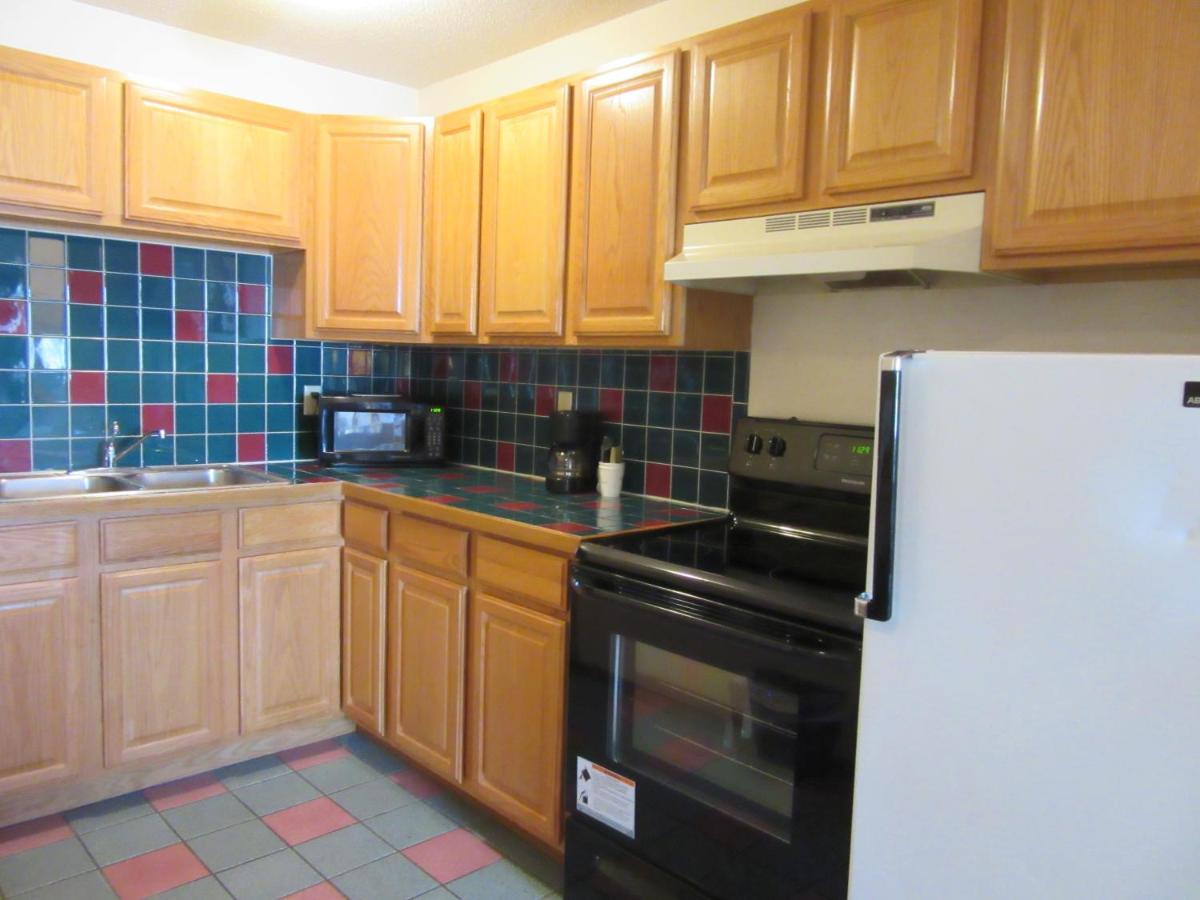 Queen Suite with Two Queen Beds and Kitchen - Non-Smoking at Howard Johnson by Wyndham Wichita Airport