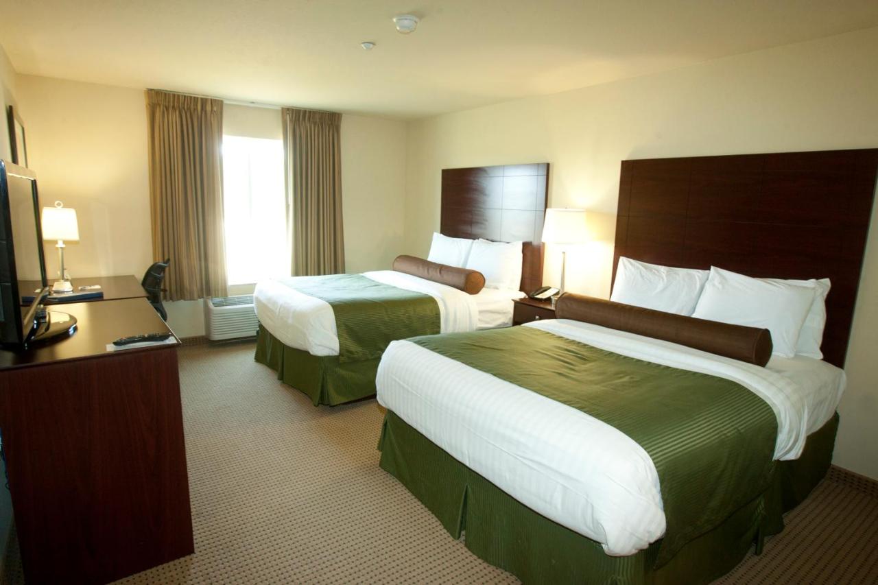 Queen Room with Two Queen Beds at Cobblestone Inn & Suites - Langdon