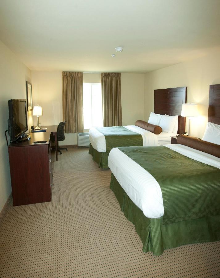 Queen Room with Two Queen Beds at Cobblestone Inn & Suites - Langdon