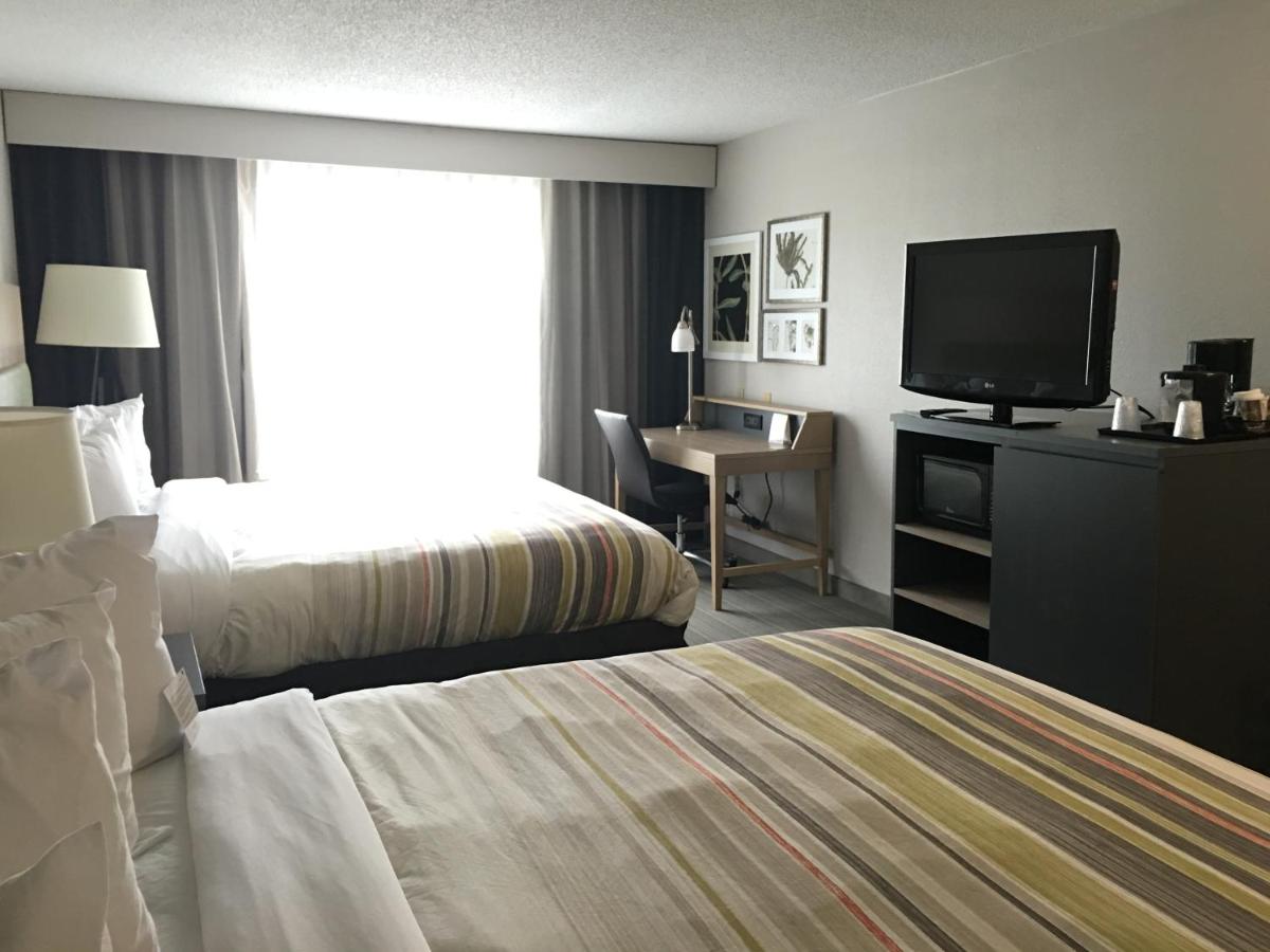 King Room with Two King Beds at Country Inn & Suites by Radisson, Camp Springs (Andrews Air Force Base), MD