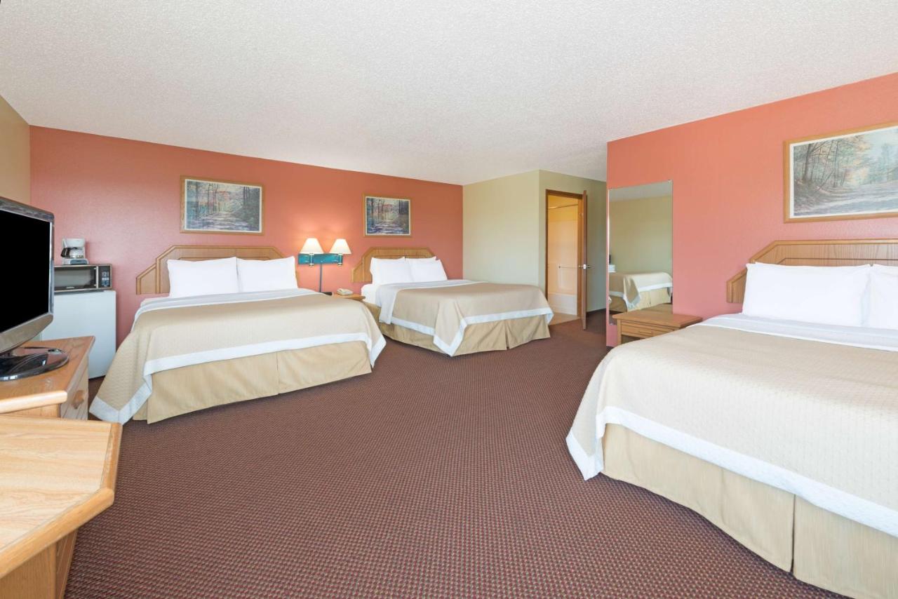 Studio Suite with Three Queen Beds - Non-Smoking at Days Inn by Wyndham Cameron
