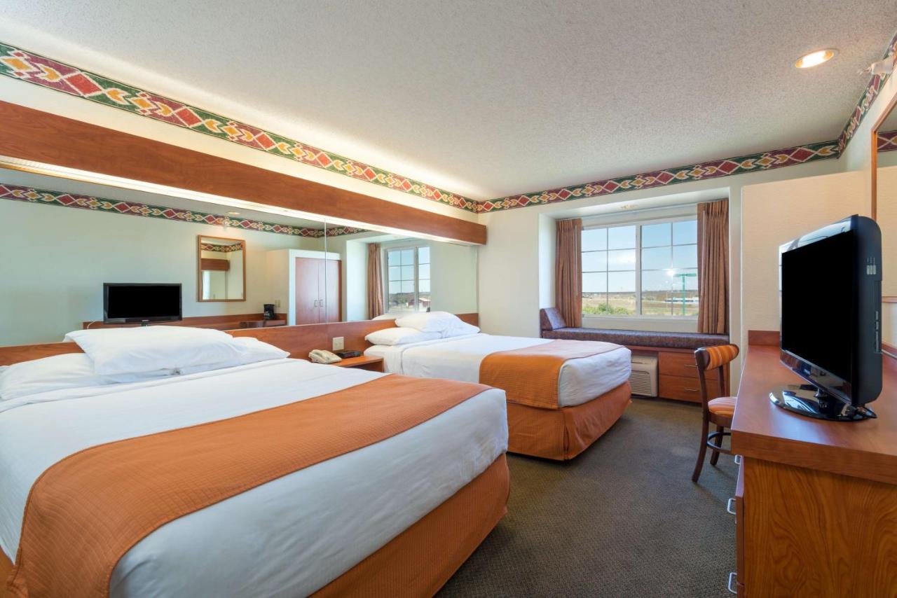 Queen Room with Two Queen Beds - Non-Smoking at Microtel Inn & Suites by Wyndham Pueblo
